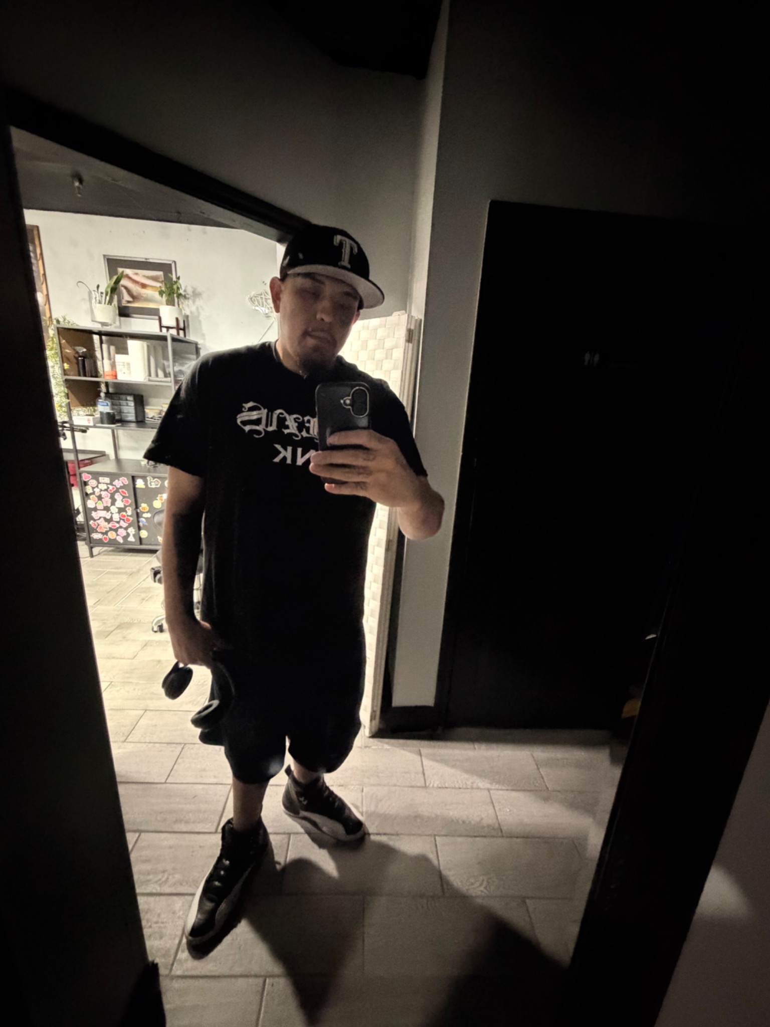 DEEZUS INK tattoo artist in the studio
