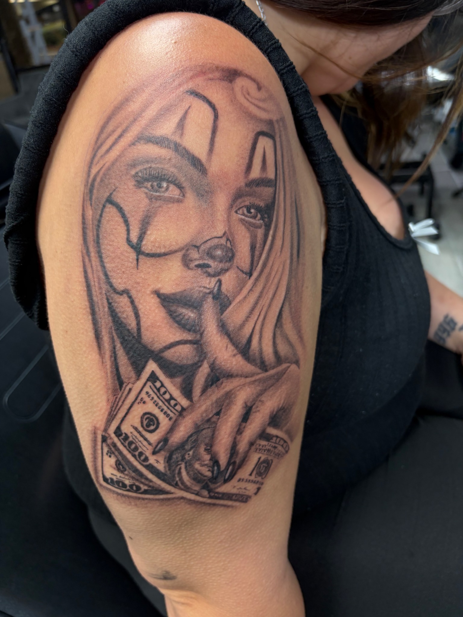 Black and grey Chicana woman and money tattoo